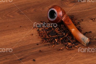 The Tabacco Pipe On The Wood Unhealthy