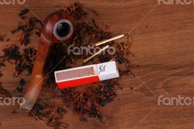 The Tabacco Pipe On The Wood Unhealthy