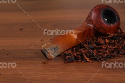 The Tabacco Pipe On The Wood Unhealthy