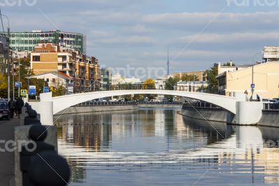 The river embankment Moscow and its reflection