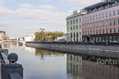 The river embankment Moscow and its reflection