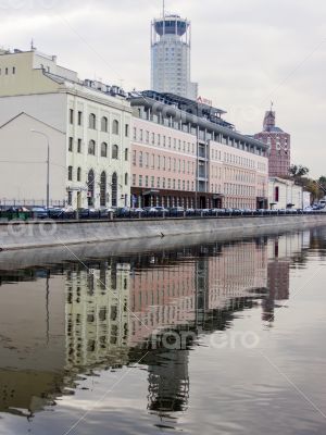 The river embankment Moscow and its reflection