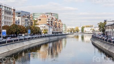 The river embankment Moscow and its reflection