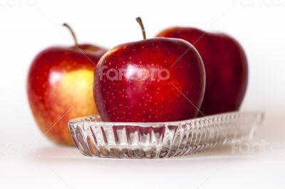 Three ripe red apples