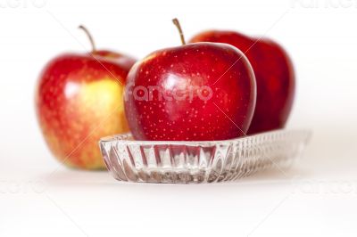 Three ripe red apples