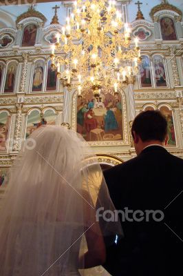 Wedding Couple in Orthodox Cathedral