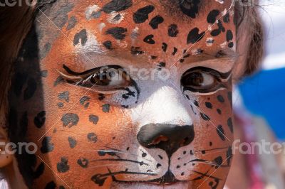 girl kid face with painted panther