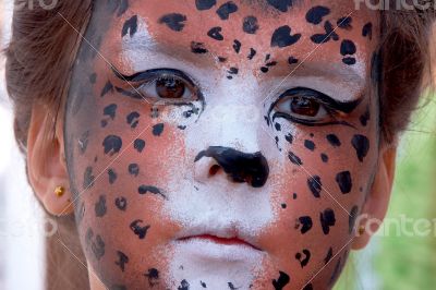 girl kid face with painted panther