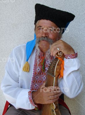 Senior ukrainian musician kobzar with bandura