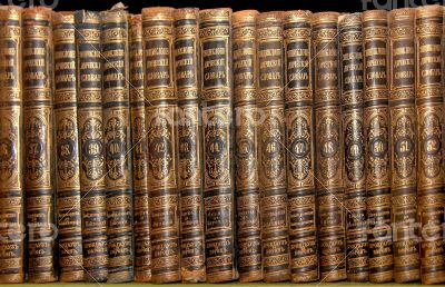 Row of old books cover spines