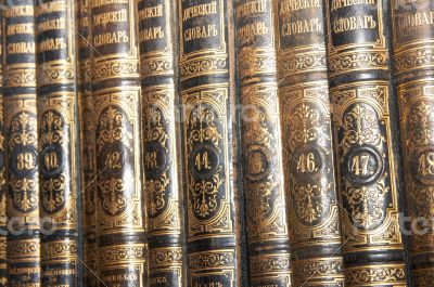 Row of old books cover spines