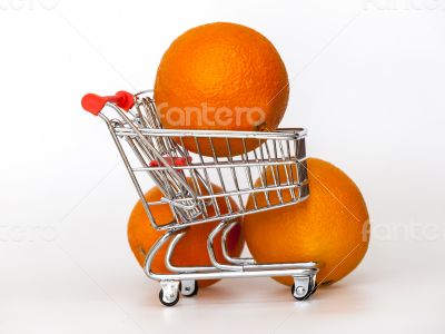 Large bright oranges in the cart for shopping
