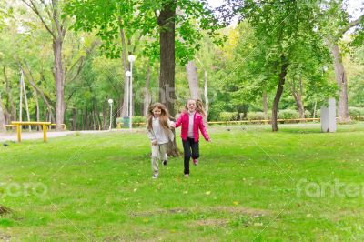 Cute two running girls