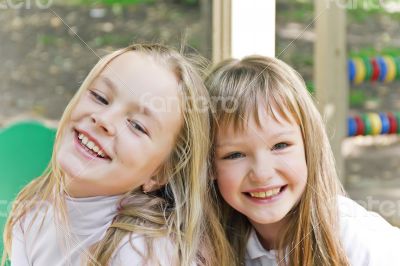 Cute two smiling girls