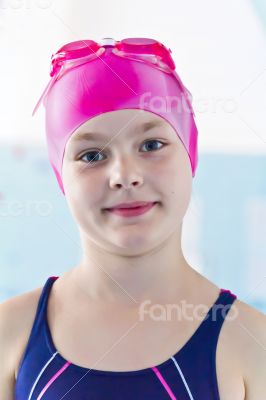 Cute girl in swimming pool