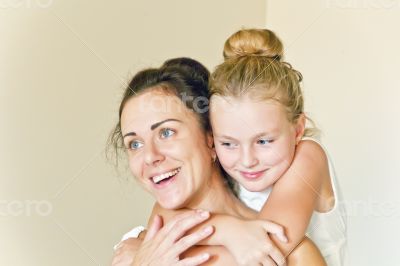 Mother and daughter in white