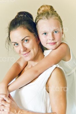 Mother and daughter in white