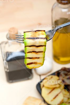 grilled zucchini courgette on a fork
