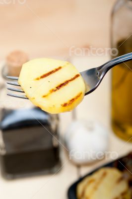 grilled potato on a fork