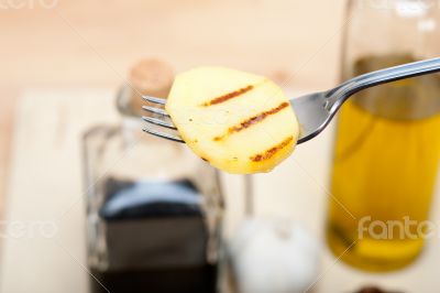 grilled potato on a fork