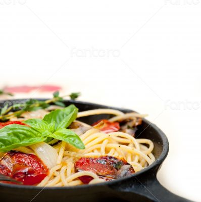 spaghetti pasta with baked cherry tomatoes and basil 