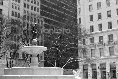 Pulitzer Fountain under the snow in black and white