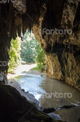 Entrance to the Tham Lod cave with stalactite and stalagmite