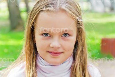 Cute girl with big blue eyes
