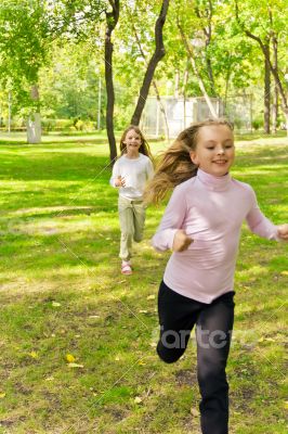 Cute two running girls