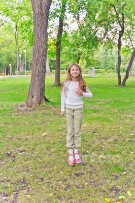 Jumping girl in summer