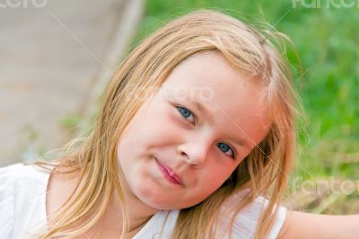 Cute girl with big blue eyes