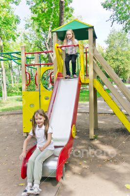 Two active girls on nursery platform