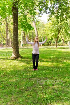 Jumping girl in summer