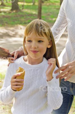 Mother and daughter makes hairstyle