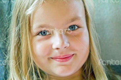 Cute girl with big blue eyes