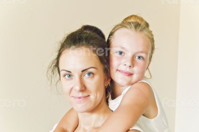 Mother and daughter in white