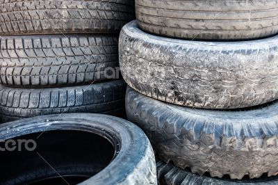 Stack of the old used tire covers.