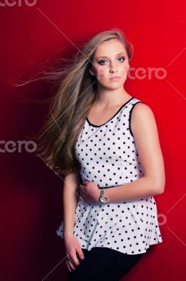 Young model against red wall