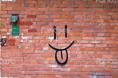 Brick Wall and Smile Graffiti 