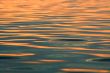 Background. Solar sparks on water.