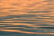 Background. Solar sparks on water.