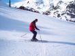 Girl on mountain skis
