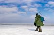 Ice Fisherman going away
