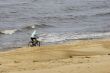 Lonely Cyclist on beach