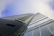 Skyscraper on cloudy sky