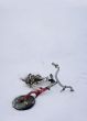 Abandoned bicycle in snow