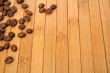 Grains of coffee on a carpet made of a bamboo