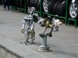 Robot sculpture. Boy and bird