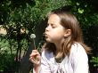 The girl with a dandelion