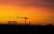 Tower crane in sunset